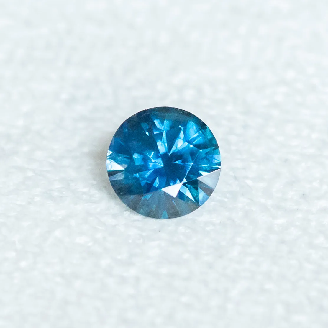 0.96CT ROUND OCEAN BLUE MONTANA SAPPHIRE, 6.00X3.9MM, HEATED